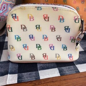 SOLD-Dooney & Bourke Cream Cosmetic Bag with rainbow monogram